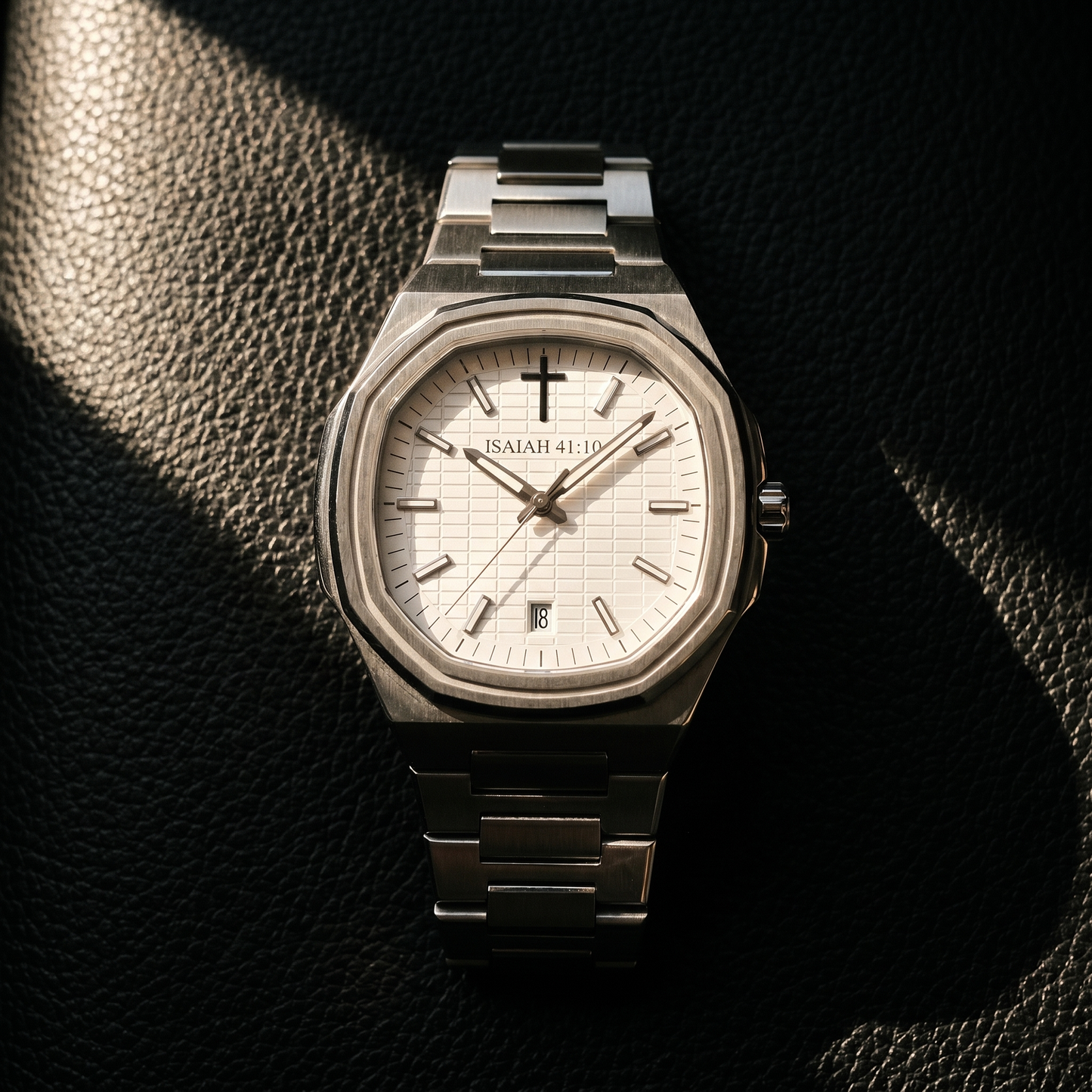 ISAIAH 41:10 on black leather with sunlight, Hodinkee editorial